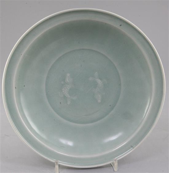 A Chinese celadon glazed twin fish dish, Song dynasty style, 25cm